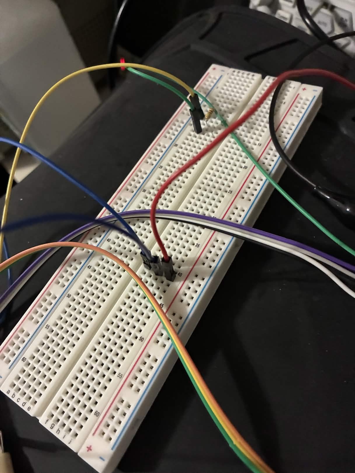 Breadboard with 4.7k pull-up between VJTAG (yellow) and nTRST (green)